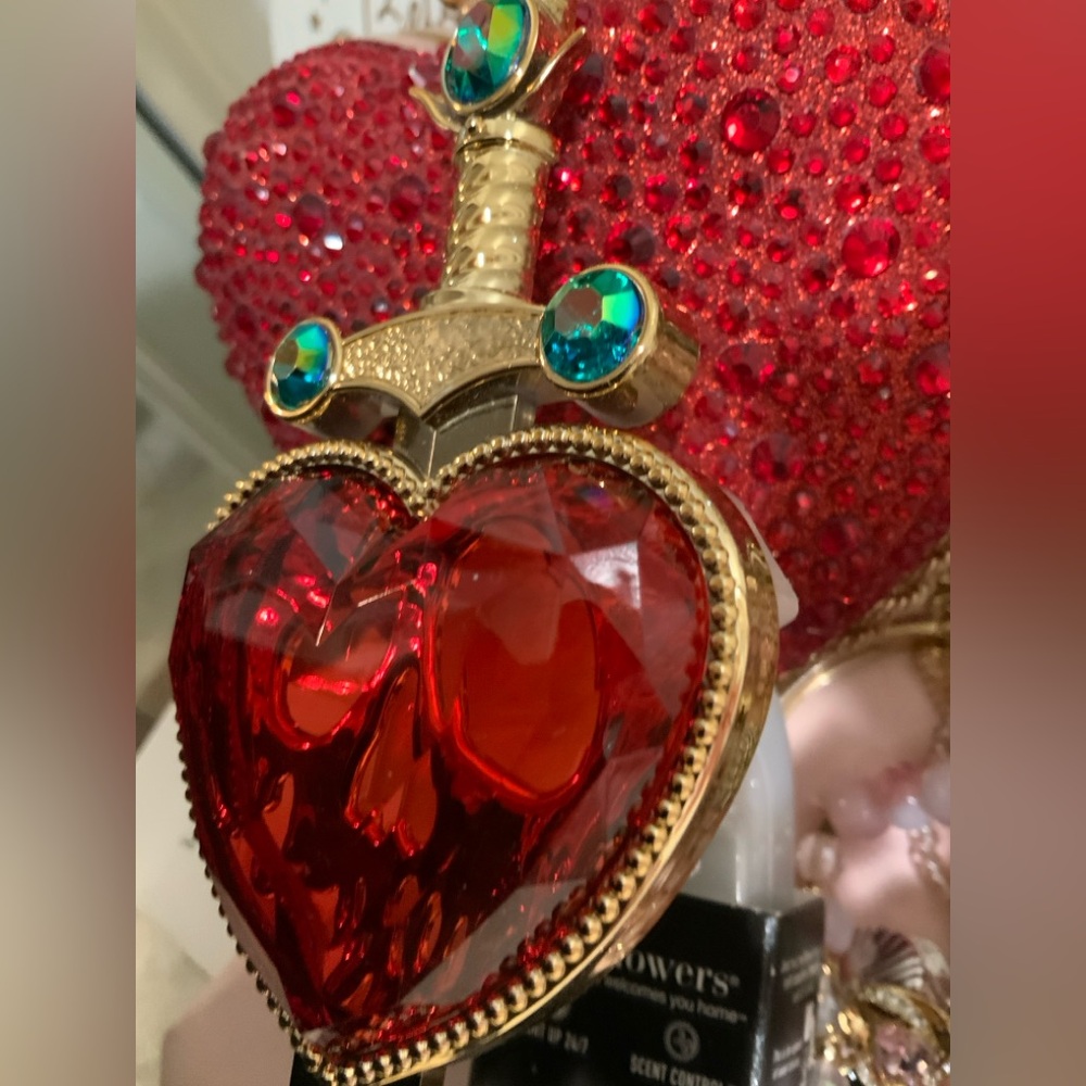 Gold Sword Heart Pendant with Red Crystal bath and bodywork’s